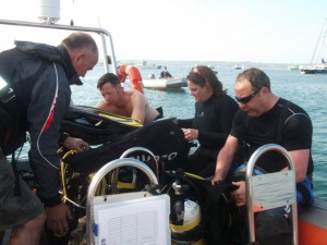 Divers getting ready on the boat